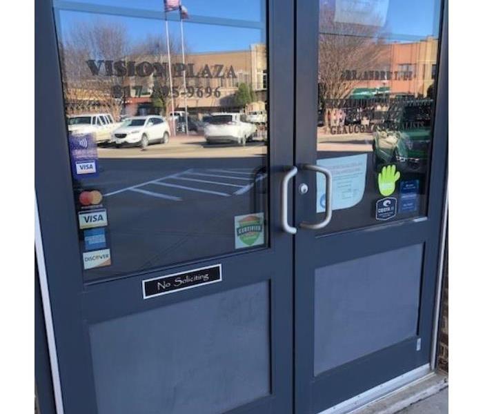 Certified: SERVPRO Cleaned sticker on the front door